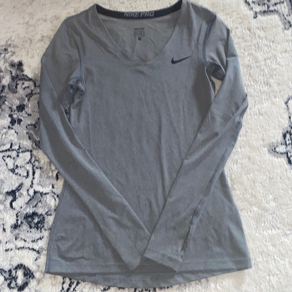 Womens Nike Pro long sleeve shirt. Worn only a couple times. Excellent condition